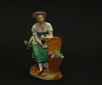 Figurine "Lady with a basket of grapes", Porcelain, "Sitzendorf", Germany, Height: 13 cm