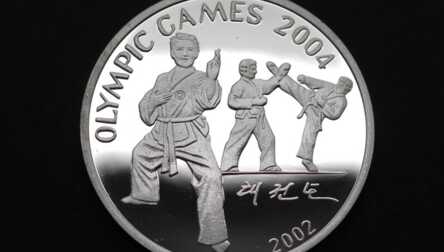 Монета "7 Вон", Серебро, 2002 год, Северная Корея